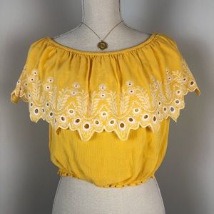 Yellow off the shoulder eyelet ruffle top